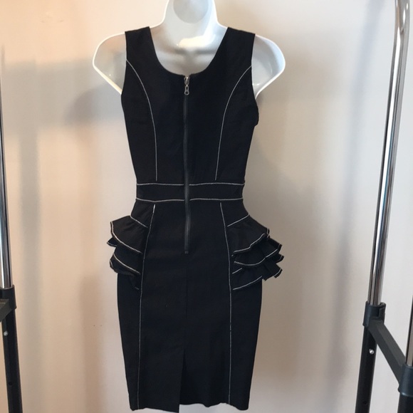 Bebe mechanical fabric peplum dress. - Picture 6 of 11